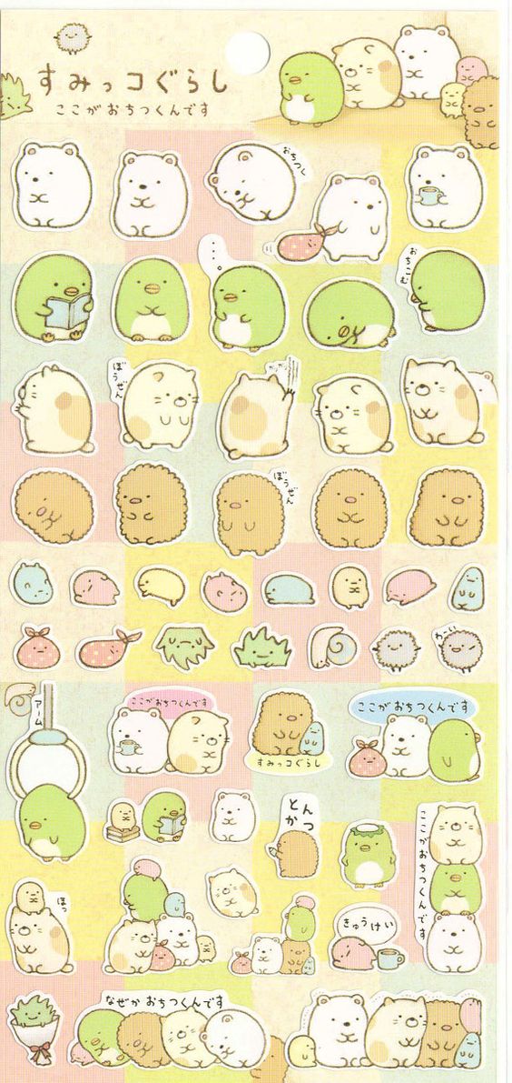 A sheet of Sumikko Gurashi stickers featuring various colorful character designs with gold foil paper accents.